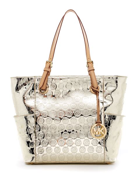 silver clutch michael kors|michael kors large gold tote.